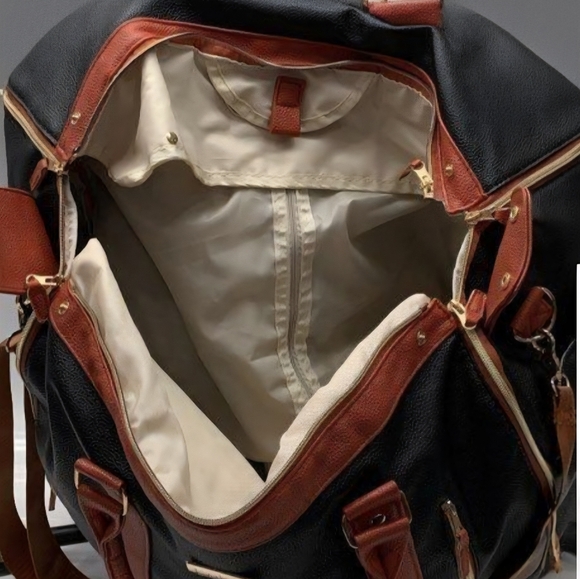 Luhxe Travel Convertible Carry On Garment Bag in black with brown straps. - Picture 4 of 5